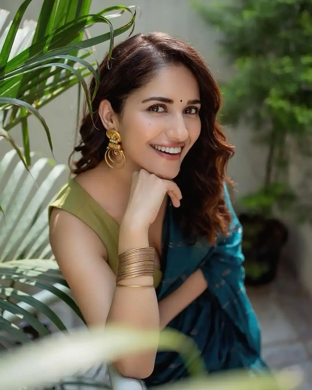 indian actress ruhani sharma in blue color saree sleeveless green blouse